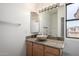 Bright bathroom features a vessel sink, granite countertop, and ample natural light from the window at 12442 N Via La Playa --, Fountain Hills, AZ 85268