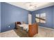 Cozy bedroom with blue walls, neutral carpet, and a ceiling fan for added comfort at 12442 N Via La Playa --, Fountain Hills, AZ 85268