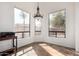 Light-filled dining area with tile floors, large windows, and a hanging chandelier at 12442 N Via La Playa --, Fountain Hills, AZ 85268