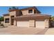 A spacious three-car garage with a red tiled roof, complementing the home's exterior at 12442 N Via La Playa --, Fountain Hills, AZ 85268