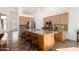 Large kitchen island with granite countertops, stainless steel appliances, and breakfast bar seating at 12442 N Via La Playa --, Fountain Hills, AZ 85268