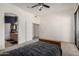 Spacious main bedroom featuring carpeted floors, a ceiling fan, and an ensuite bathroom with a walk-in closet at 12442 N Via La Playa --, Fountain Hills, AZ 85268