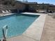 Sparkling community pool with lounge chairs, restroom, and pergola at 12442 N Via La Playa --, Fountain Hills, AZ 85268