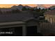 South facing rear exterior showcasing Arizona's beautiful sunset views and neighborhood architecture at 12442 N Via La Playa --, Fountain Hills, AZ 85268