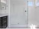 Bathroom featuring a modern glass shower with white tile and black hardware at 14194 W Sand Hills Rd, Surprise, AZ 85387