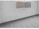 Bright bedroom with carpet flooring and a large window at 14194 W Sand Hills Rd, Surprise, AZ 85387