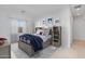 Cozy bedroom with a themed decor, built-in shelving, and soft lighting creating a peaceful atmosphere at 14194 W Sand Hills Rd, Surprise, AZ 85387