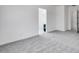 Neutral bedroom featuring neutral carpet and an open doorway to another room at 14194 W Sand Hills Rd, Surprise, AZ 85387