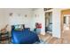 Charming bedroom featuring bright white walls and wood floors, plus fun, playful decor for children at 1600 N Saba St # 177, Chandler, AZ 85225