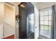 Hallway featuring a storage cabinet and a door to the outside at 1600 N Saba St # 177, Chandler, AZ 85225