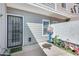 Private patio area featuring a door with a metal security screen and a bicycle at 1600 N Saba St # 177, Chandler, AZ 85225