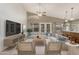 Inviting living room seamlessly connected to the kitchen and a comfortable seating area at 1626 W Acoma Dr, Phoenix, AZ 85023