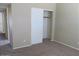 Bedroom with plush carpet and a closet with sliding doors at 16528 E Gunsight Dr # 206, Fountain Hills, AZ 85268