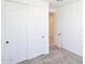Bedroom features carpeted floors and sliding door closet at 1661 N St Francis Pl, Casa Grande, AZ 85122