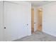 Bedroom features carpeted floors and sliding door closet at 1661 N St Francis Pl, Casa Grande, AZ 85122