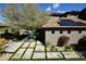 Outdoor living space with solar panels, modern patio and backyard at 17594 N 98Th Way, Scottsdale, AZ 85255