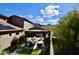 Beautiful backyard featuring a covered patio, landscaping, and mountain views at 17594 N 98Th Way, Scottsdale, AZ 85255