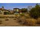 Stylish two-story home with a balcony and desert landscaping at 17594 N 98Th Way, Scottsdale, AZ 85255