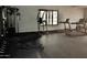 Well-equipped exercise room with treadmills, weight machines, and free weights for a complete fitness experience at 17594 N 98Th Way, Scottsdale, AZ 85255
