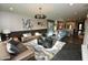 Stylish living room with modern decor, comfortable seating, and an open layout at 17594 N 98Th Way, Scottsdale, AZ 85255