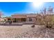 Charming home featuring a patio and desert landscaping for low maintenance appeal at 18155 N Sterling Dr, Surprise, AZ 85374