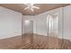 Spacious bedroom with hardwood floors offers multiple entryways and ample space at 18155 N Sterling Dr, Surprise, AZ 85374