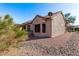 This home features a tile roof, desert landscaping, and a private yard at 18155 N Sterling Dr, Surprise, AZ 85374