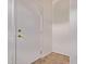 Neutral colored interior front door with gold hardware and tiled flooring at 18155 N Sterling Dr, Surprise, AZ 85374