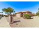 Charming desert home with a three-car garage, mature landscaping and a neutral color palette, exuding classic charm at 18155 N Sterling Dr, Surprise, AZ 85374