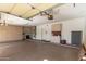 Large two-car garage offers lots of built-in storage cabinets and room for parking at 18155 N Sterling Dr, Surprise, AZ 85374