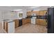 Kitchen with wooden cabinets, granite countertops, and black appliances at 18155 N Sterling Dr, Surprise, AZ 85374