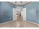 Open doorway reveals the light and airy floorplan in this beautiful home at 18155 N Sterling Dr, Surprise, AZ 85374
