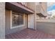 Charming entryway with tiled front patio and stylish front door, creating inviting curb appeal at 1905 E University Dr # 162, Tempe, AZ 85288