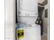 Efficient laundry area featuring a stacked washer and dryer unit, maximizing space at 1905 E University Dr # 162, Tempe, AZ 85288