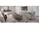 Cozy living room featuring modern furniture, neutral tones, and stylish decor at 1905 E University Dr # 162, Tempe, AZ 85288