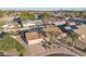 Aerial view of home and neighborhood features desert landscaping and beautiful palm trees at 2004 W Kristal Way, Phoenix, AZ 85027