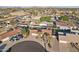 Aerial view of home and neighborhood features desert landscaping and beautiful palm trees at 2004 W Kristal Way, Phoenix, AZ 85027