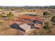 Aerial view of a well-kept baseball field, with covered benches and a concession stand nearby, in a community park at 2004 W Kristal Way, Phoenix, AZ 85027