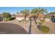 Charming single-story home with desert landscaping, mature palm trees, and a two-car garage in a desirable location at 2004 W Kristal Way, Phoenix, AZ 85027