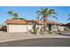 Charming single-story home with a two-car garage, desert landscaping, and a well-maintained front yard at 2004 W Kristal Way, Phoenix, AZ 85027