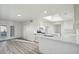 Bright and airy kitchen with a large island, stainless steel appliances, and seamless access to the dining area at 2004 W Kristal Way, Phoenix, AZ 85027