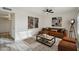 Tastefully furnished living room with modern decor and wood-look flooring at 2004 W Kristal Way, Phoenix, AZ 85027