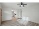 Open living area with views into the updated kitchen and modern gray flooring at 2004 W Kristal Way, Phoenix, AZ 85027