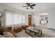 Inviting living room with hardwood floors, ample natural light, and seamless access to the kitchen at 2004 W Kristal Way, Phoenix, AZ 85027