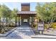 Picturesque outdoor bar and kitchen area surrounded by lush landscaping and desert views at 20584 W Hillcrest Blvd, Buckeye, AZ 85396