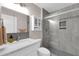 Beautiful bathroom with neutral tile, toilet, sink and glass shower at 21640 N 48Th St, Phoenix, AZ 85054
