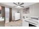Bedroom with ceiling fan and a painting on the wall at 21640 N 48Th St, Phoenix, AZ 85054