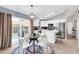 Eat-in kitchen and dining area featuring stainless steel appliances and patio access at 21640 N 48Th St, Phoenix, AZ 85054