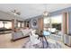 Spacious living room features an eat-in kitchen and access to a patio area at 21640 N 48Th St, Phoenix, AZ 85054