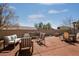 This outdoor patio features stylish seating, a serene fountain, and beautiful landscaping for relaxation and entertainment at 2423 W Bramble Berry Ln, Phoenix, AZ 85085